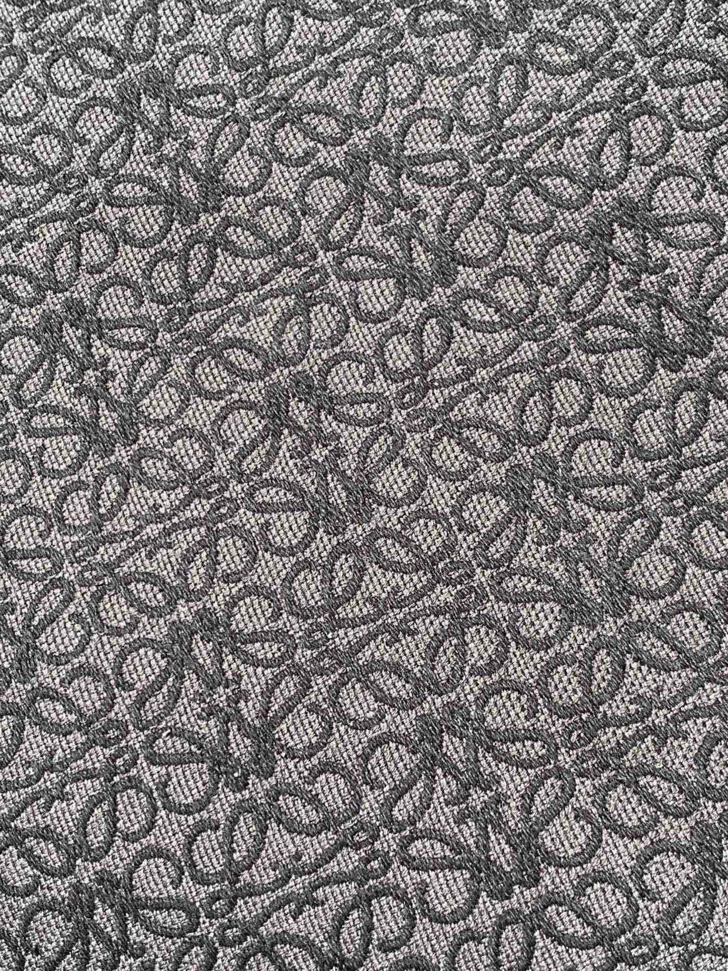 Jacquard fabric pattern for a Loewe tote bag in dark charcoal tones
