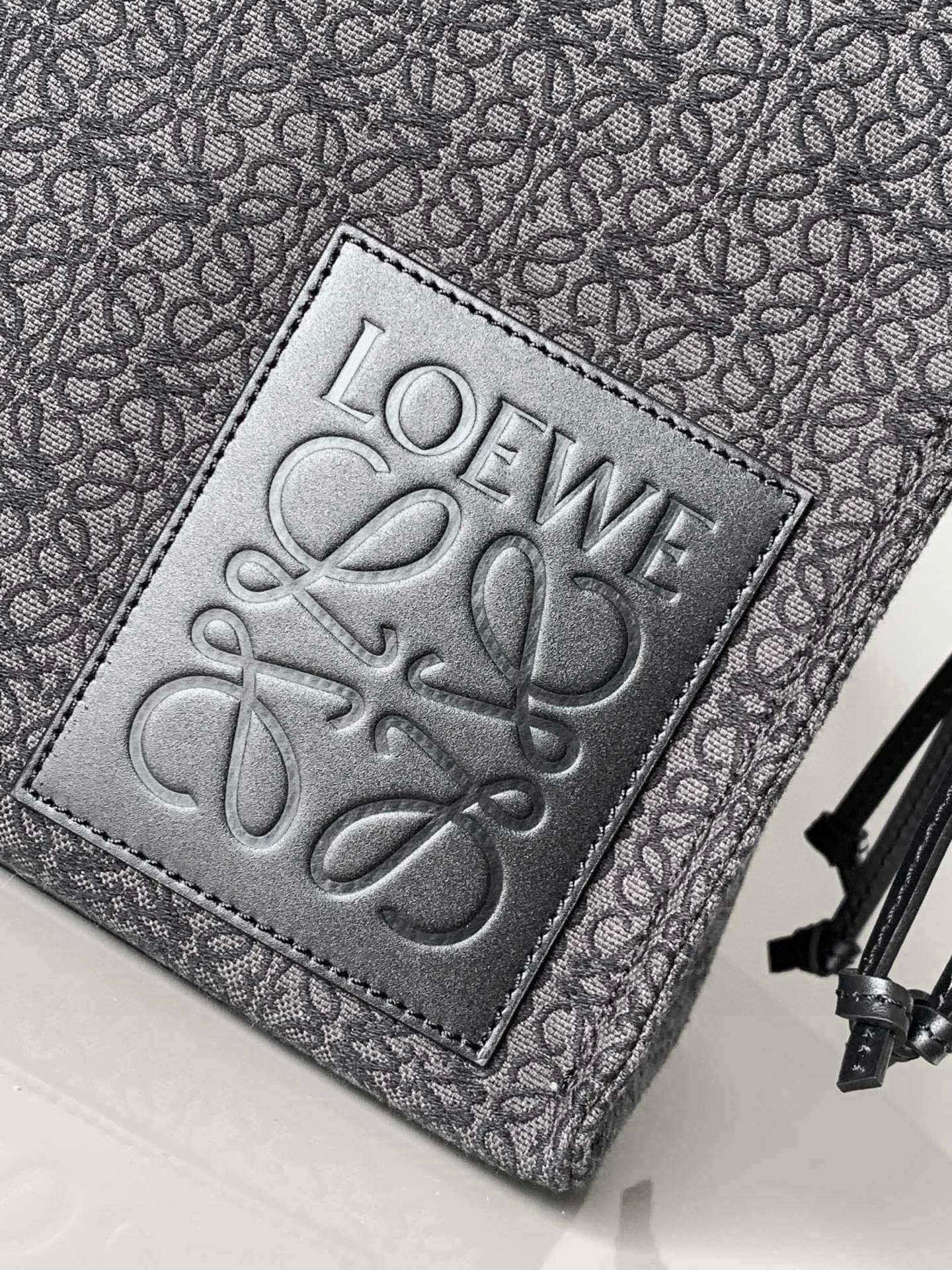 Loewe logo patch on jacquard tote bag, textured leather patch and stitched edge