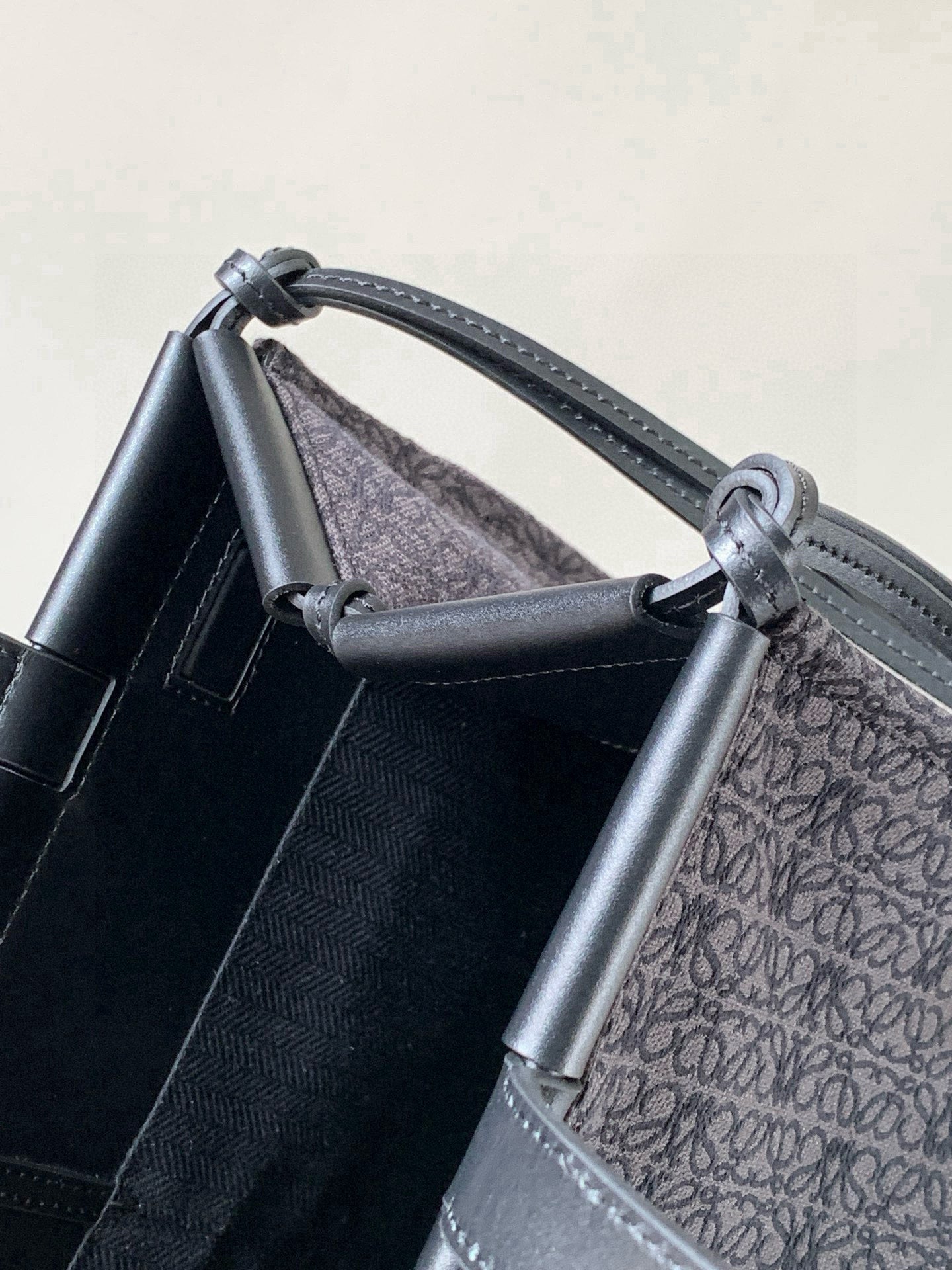 Loewe tote bag interior view with top handle straps and structured sides