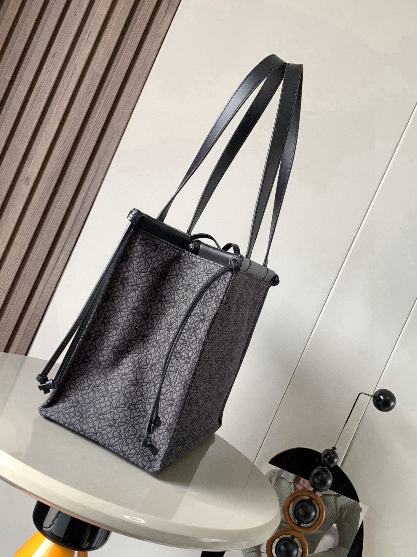 Loewe jacquard tote bag with dual top handles and drawstring side detail