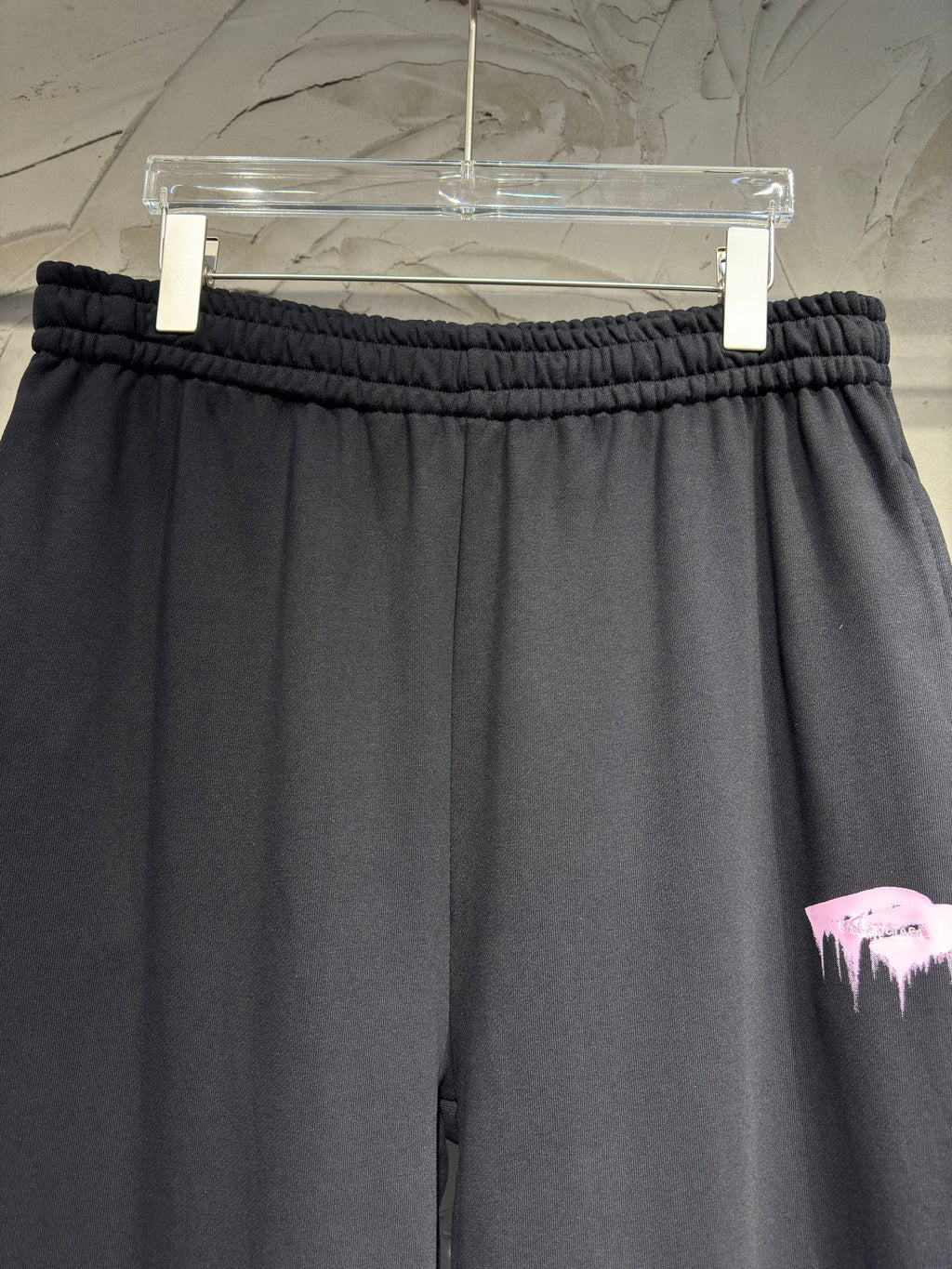 Black wide-leg pants with gathered elastic waistband