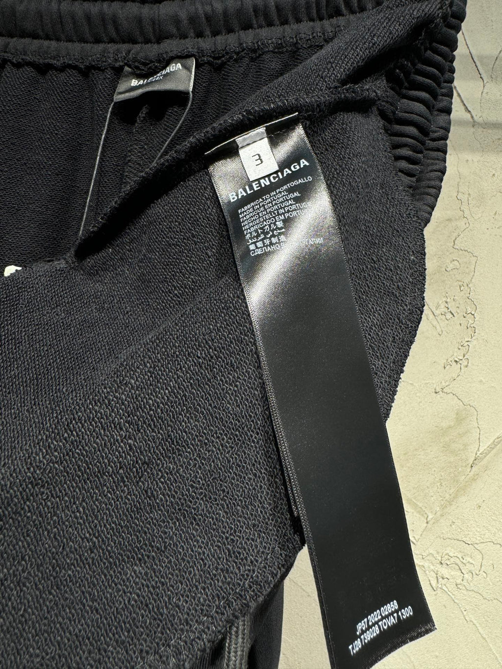Black Balenciaga track pants with elastic waistband and inner size tag