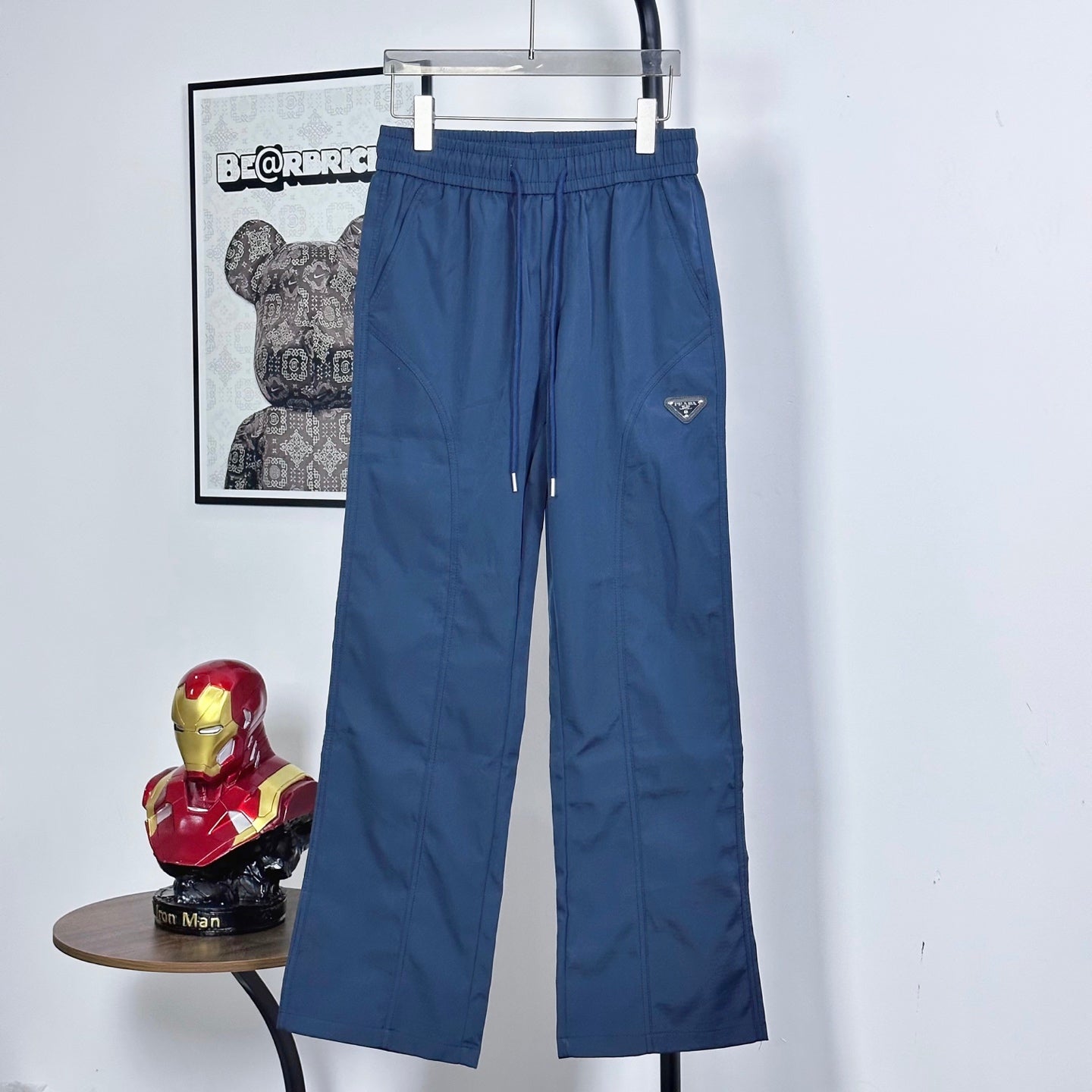 Prada pants in dark blue with elastic waist, drawstring, and side pockets