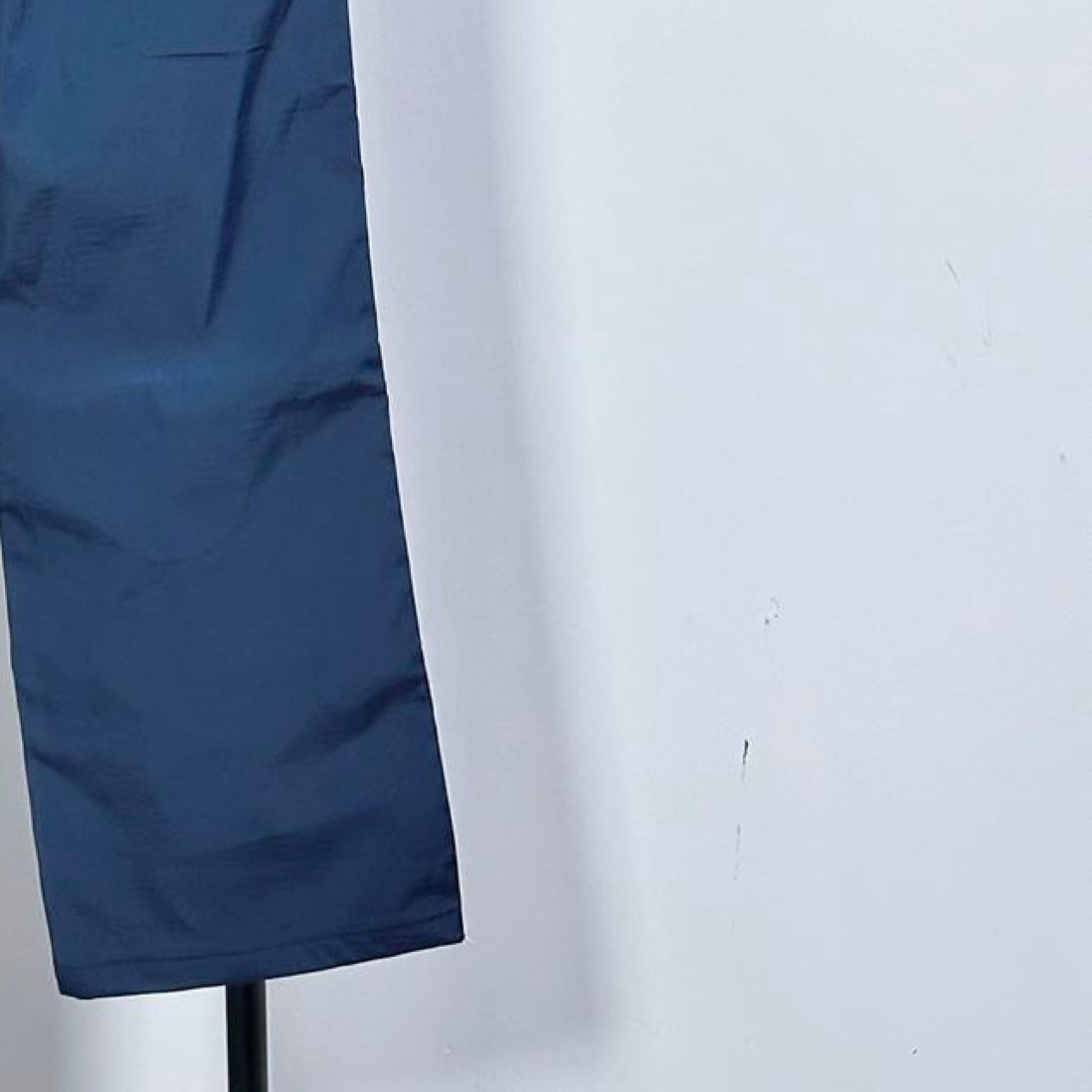 Dark blue pants hem with folded cuff