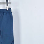 Prada pants in dark blue with elastic waist and relaxed fit through the thigh