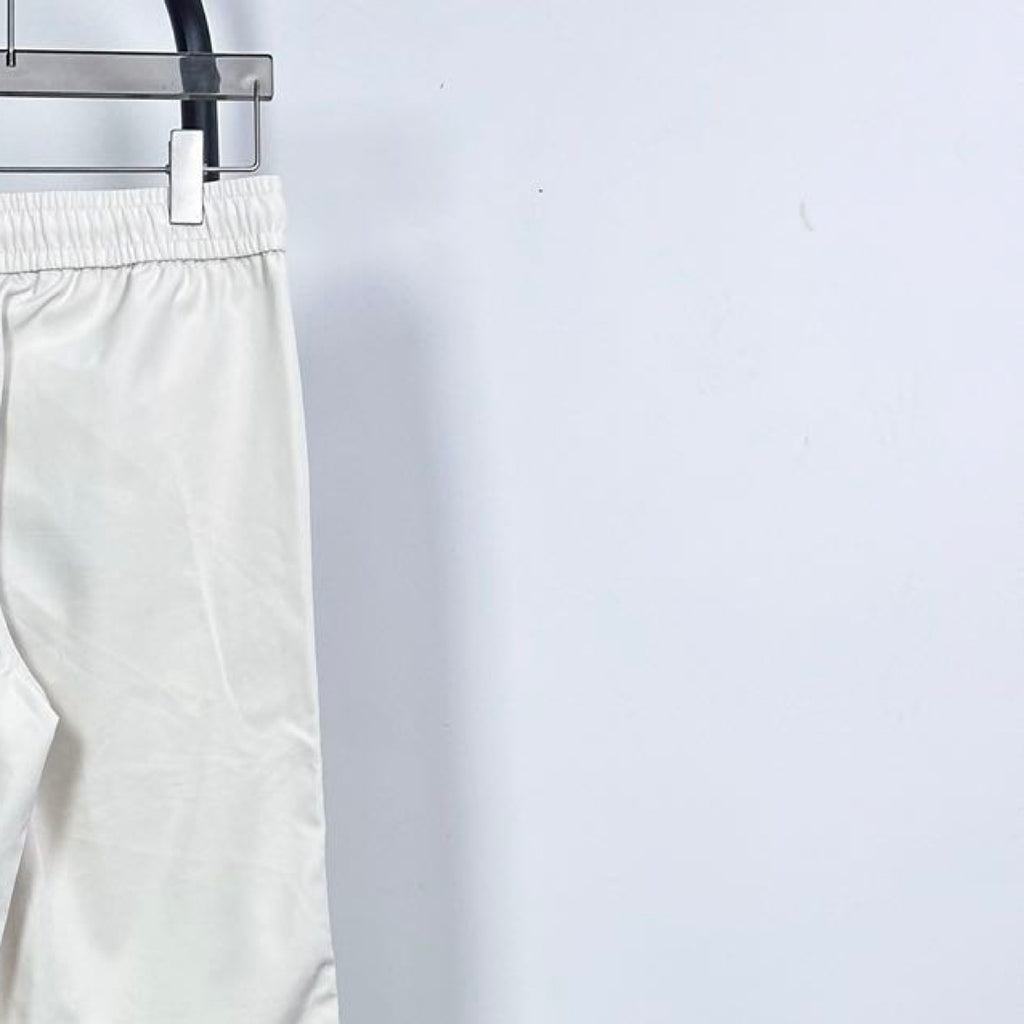 Prada white pants, elastic waist and relaxed fit, cropped view