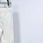 Prada white pants, elastic waist and relaxed fit, cropped view