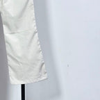 White pants leg with cuffed hem