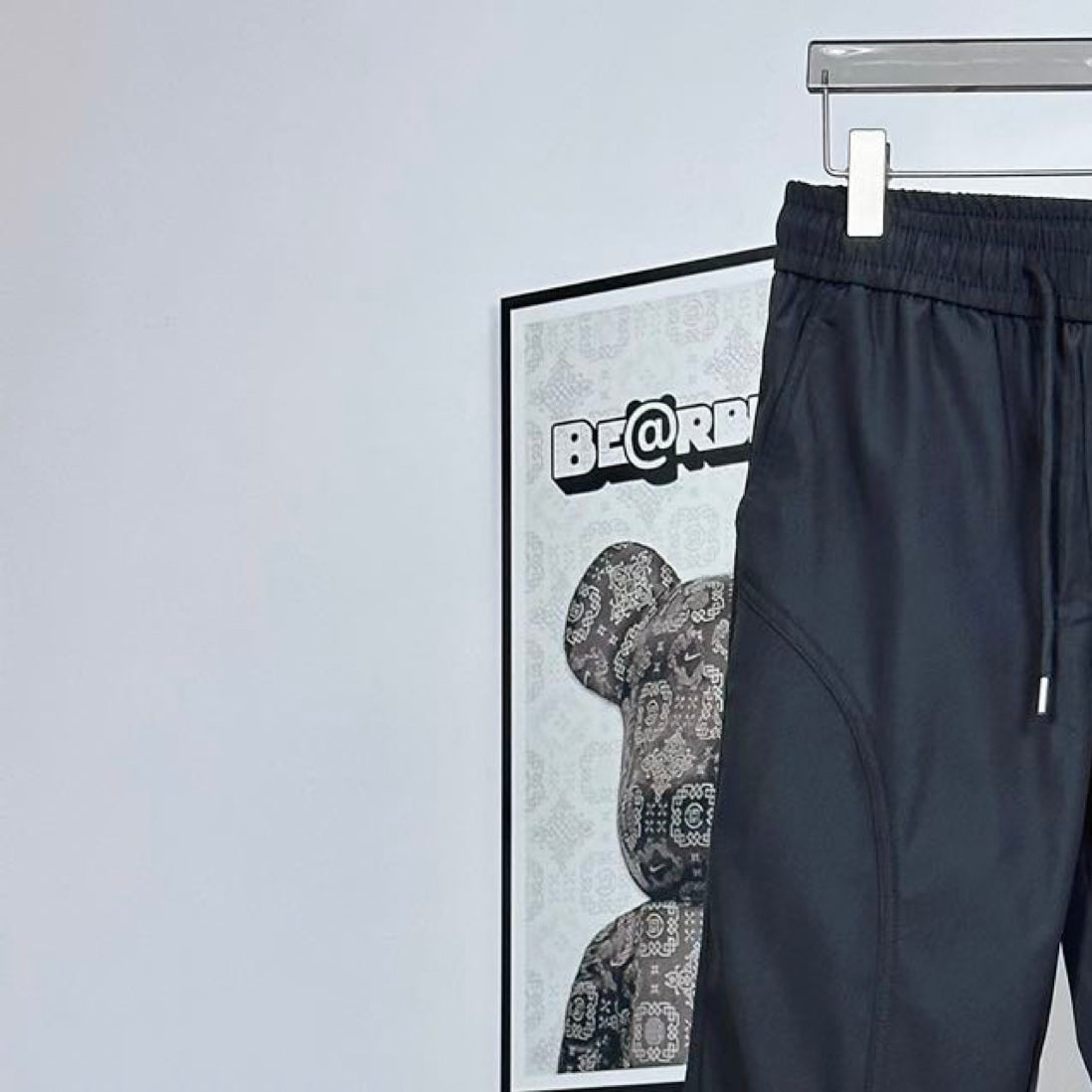 Prada pants in dark navy with elastic waistband and side pocket seam detail