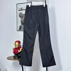 Prada pants in dark navy with elastic waist, drawstring, and relaxed straight fit