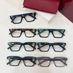 Assorted rectangular eyeglasses with clear lenses and mixed dark frame colors in one view