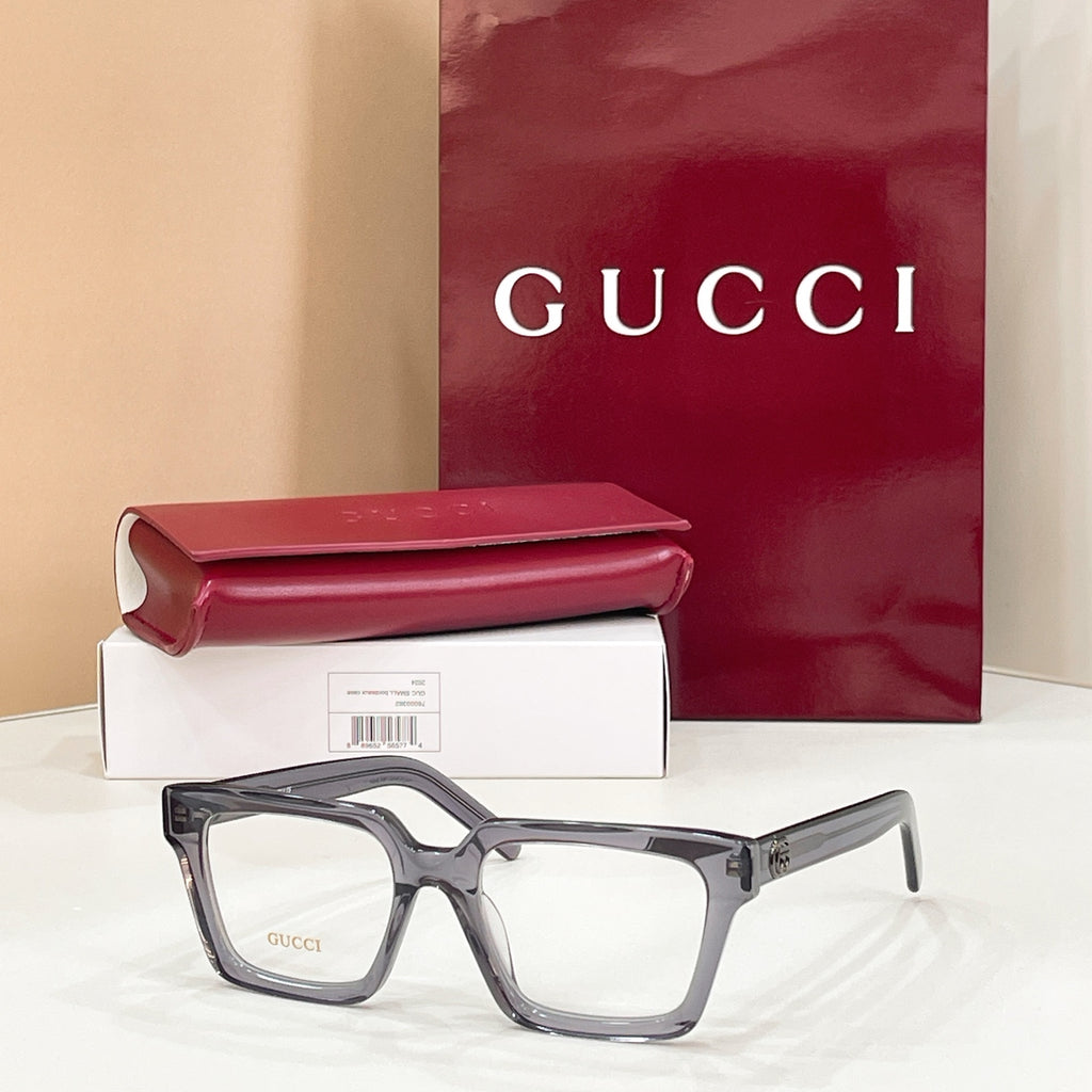 Rectangular eyeglasses with gray frame and clear lenses, tortoiseshell pattern on temples