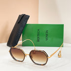 Bottega Veneta sunglasses with gold-tone frame and brown-tinted lenses