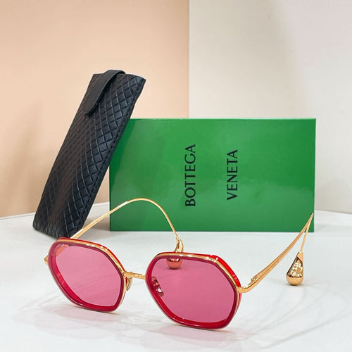 Bottega Veneta sunglasses with gold-tone frame and pink-tinted lenses