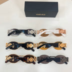 Set of Versace sunglasses on display, mixed frames with round lenses