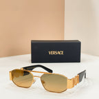 Versace sunglasses with amber lenses, gold frame, and logo temple arm detailing