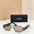 Versace sunglasses with dark lenses, silver frame, and logo temple details