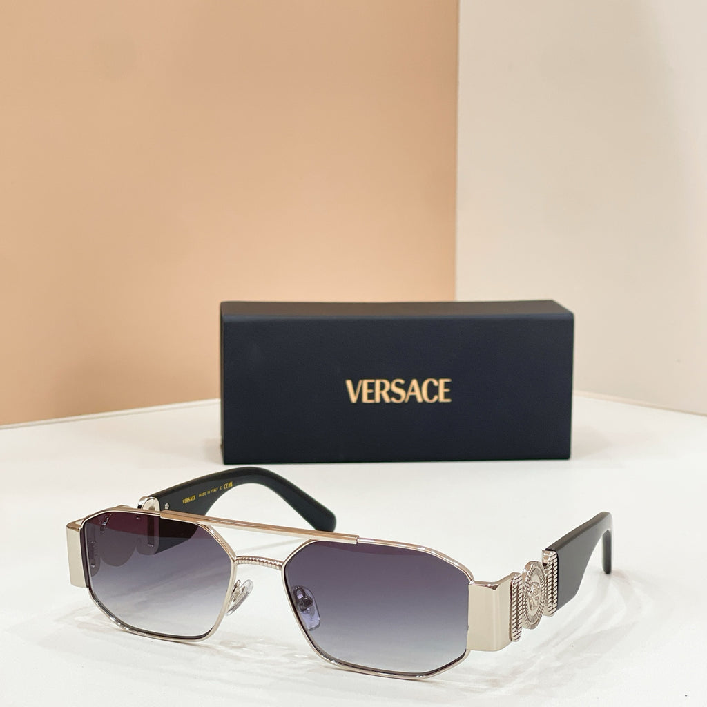 Versace sunglasses with dark lenses, silver frame, and logo temple details