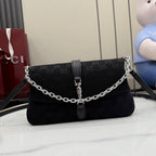 Gucci chain shoulder bag in black jacquard canvas with front flap and buckle strap