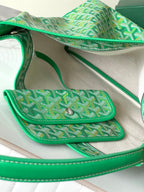 Green patterned handbag with flap pocket and silver snap closure