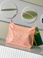 Goyard pink patterned shoulder bag with curved top handle