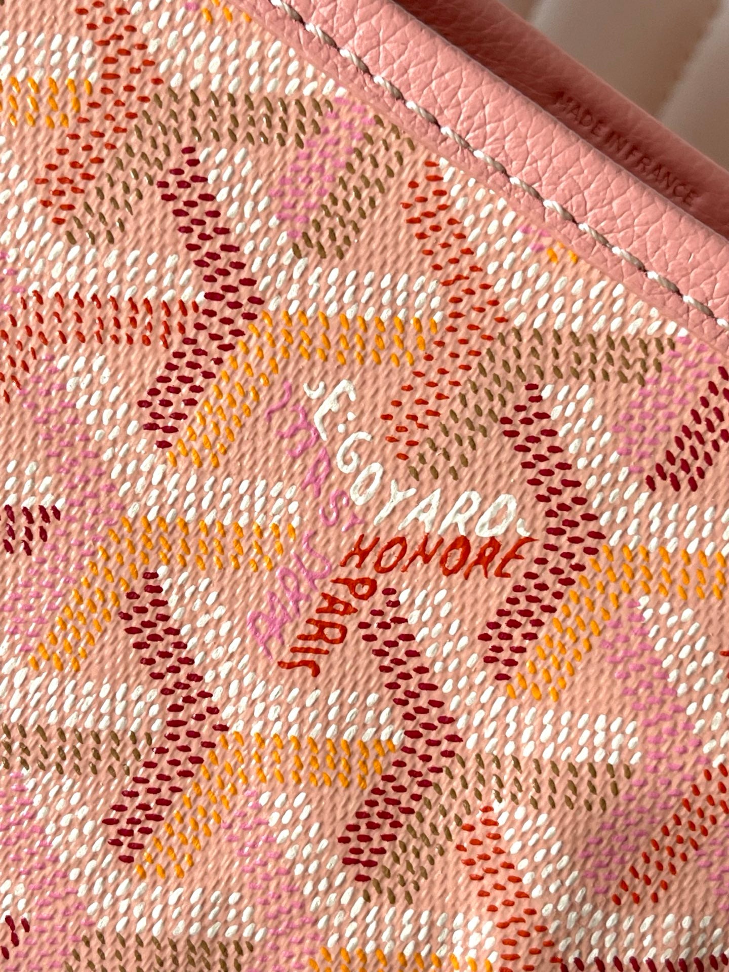 Goyard pink monogram fabric panel with woven texture and small embroidered detail