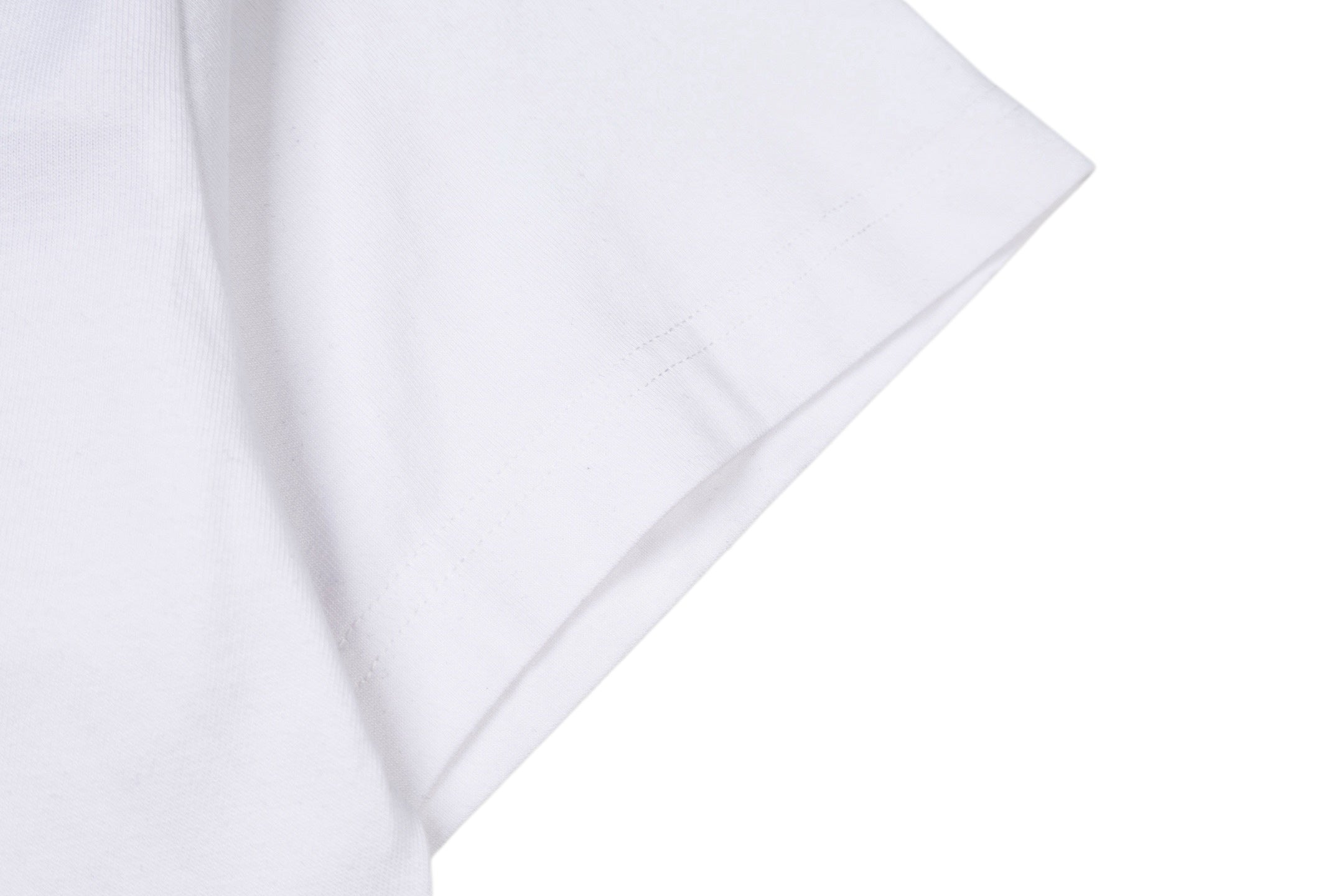 Givenchy white T-shirt sleeve and side seam close-up