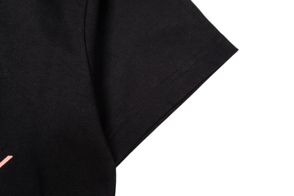 Givenchy black T-shirt sleeve and curved side hem detail