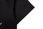 Givenchy black T-shirt sleeve and curved side hem detail