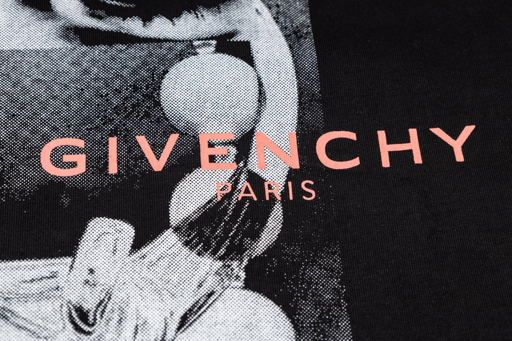 Givenchy T-shirt close-up of red “GIVENCHY PARIS” logo on graphic