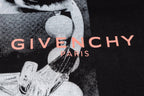 Givenchy T-shirt close-up of red “GIVENCHY PARIS” logo on graphic