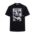 Givenchy black crew-neck T-shirt with face graphic and “Givenchy Paris” print