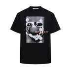 Givenchy black crew-neck T-shirt with face graphic and “Givenchy Paris” print