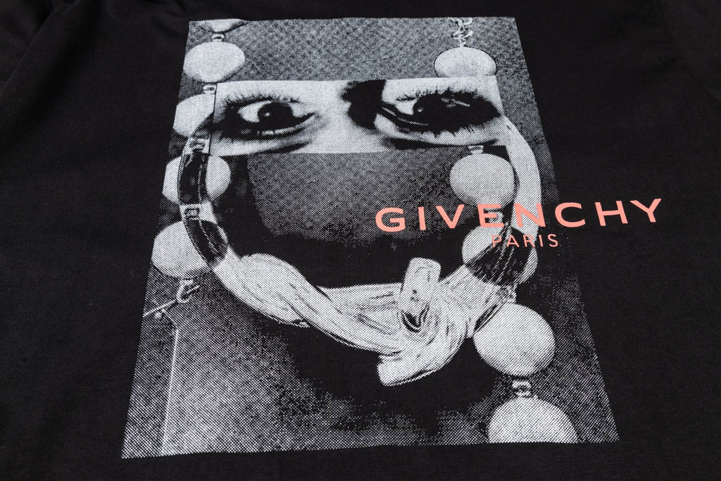 Givenchy black T-shirt graphic close-up with multicolor “GIVENCHY PARIS” logo