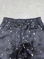 Navy rose-pattern shorts with elastic waist and adjustable drawstring