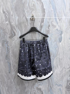 Navy printed shorts with all-over white rose motif and elastic waist