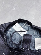 Navy rose-print shorts with elastic waistband, inner lining, and hanging tags