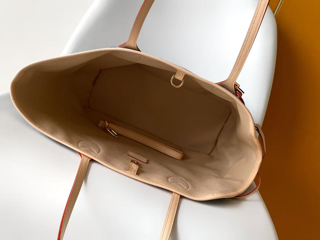 Louis Vuitton tote bag interior view with tan lining and front pocket