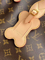 Louis Vuitton monogram tote bag bone-shaped leather charm with gold buckle