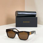 Tortoise brown square sunglasses with gold logo temple detail and tinted lenses