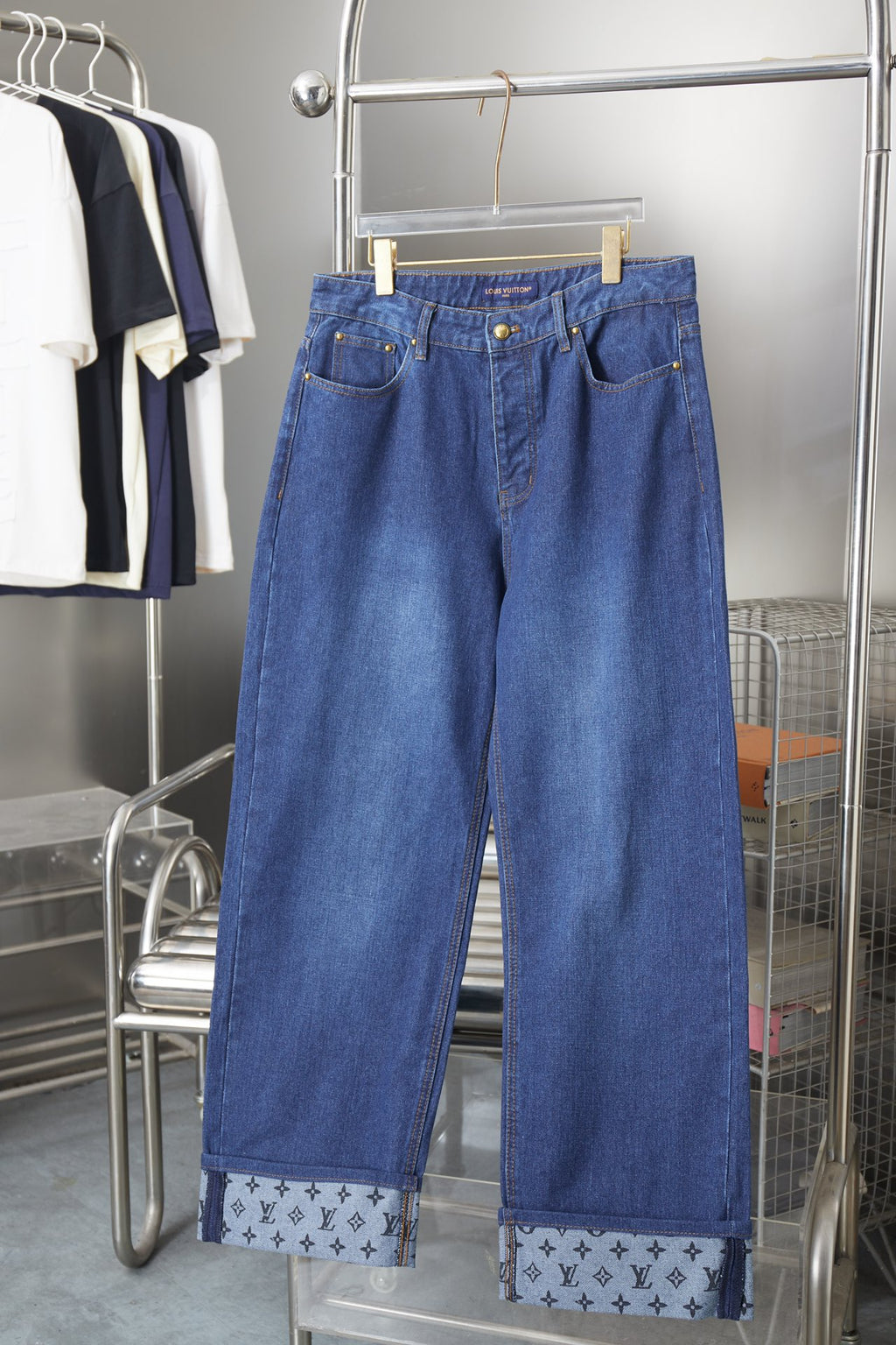 Louis Vuitton blue denim wide-leg pants, side pockets, logo-pattern hem panels