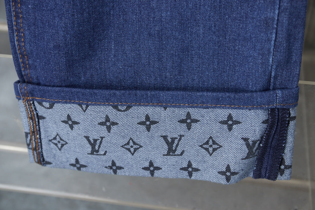 Louis Vuitton denim hem panel with repeating logo pattern