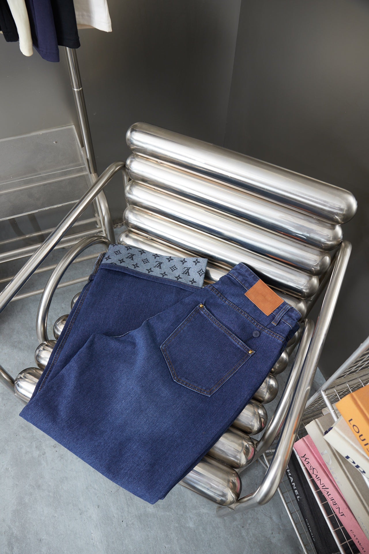 Louis Vuitton blue denim pants with logo-pattern cuff trim and front pockets