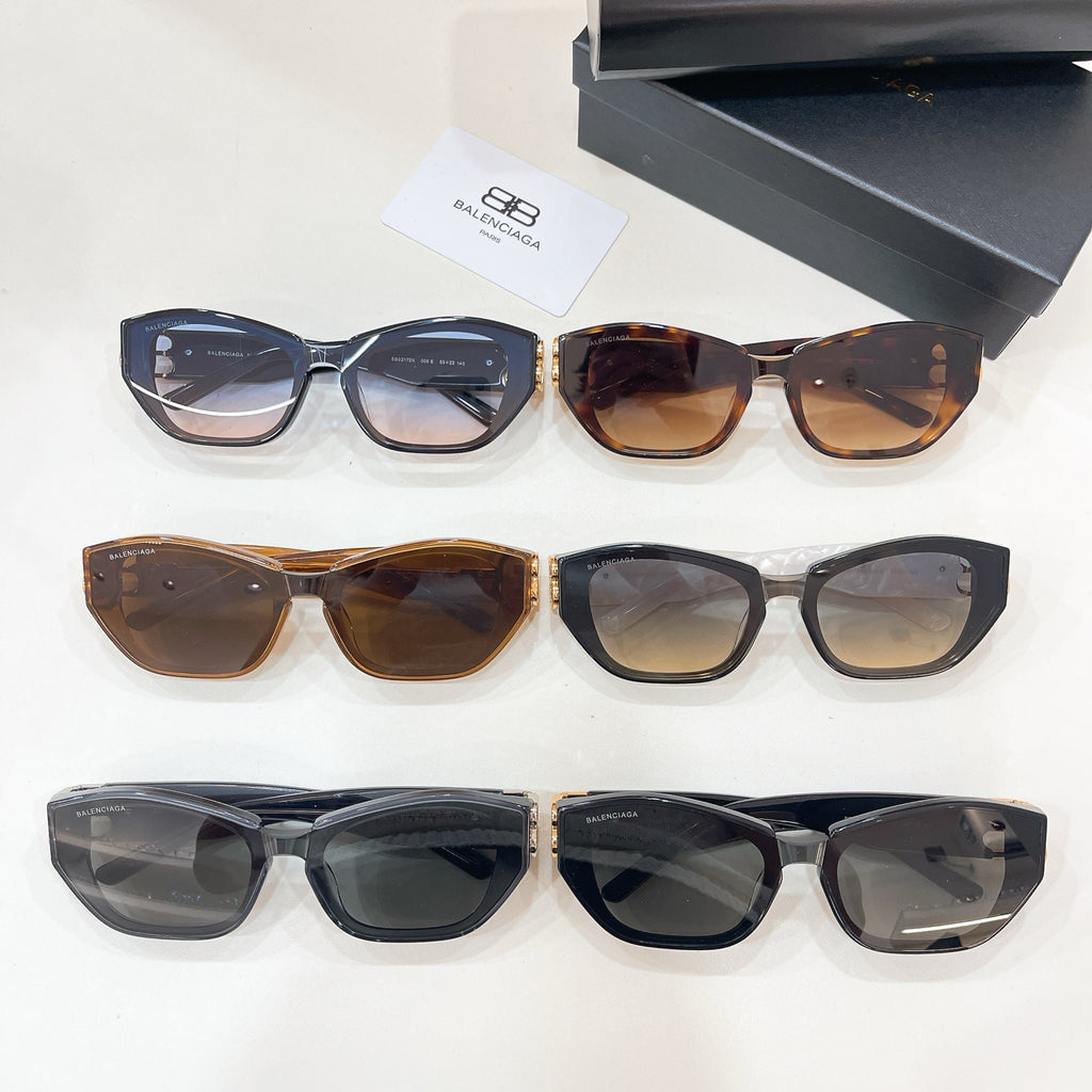 Assorted cat-eye sunglasses with tinted lenses, featuring black and tortoise frames