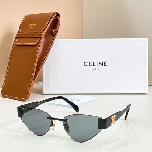 Cat-eye sunglasses with gray-tinted lenses and black frame, gold-tone hinges