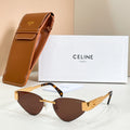 Cat-eye sunglasses with brown-tinted lenses and gold-tone frame