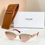 Cat-eye sunglasses with blush-pink temples and gold-tone frame, tinted lenses