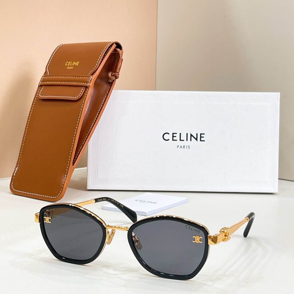 Celine black sunglasses with gold-tone top bar and dark round lenses