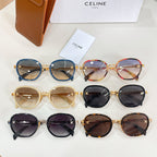 Set of round sunglasses on display with blue, tortoiseshell, and black frames