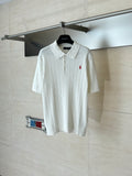 White Ralph Lauren cable-knit polo shirt with short sleeves and buttoned collar